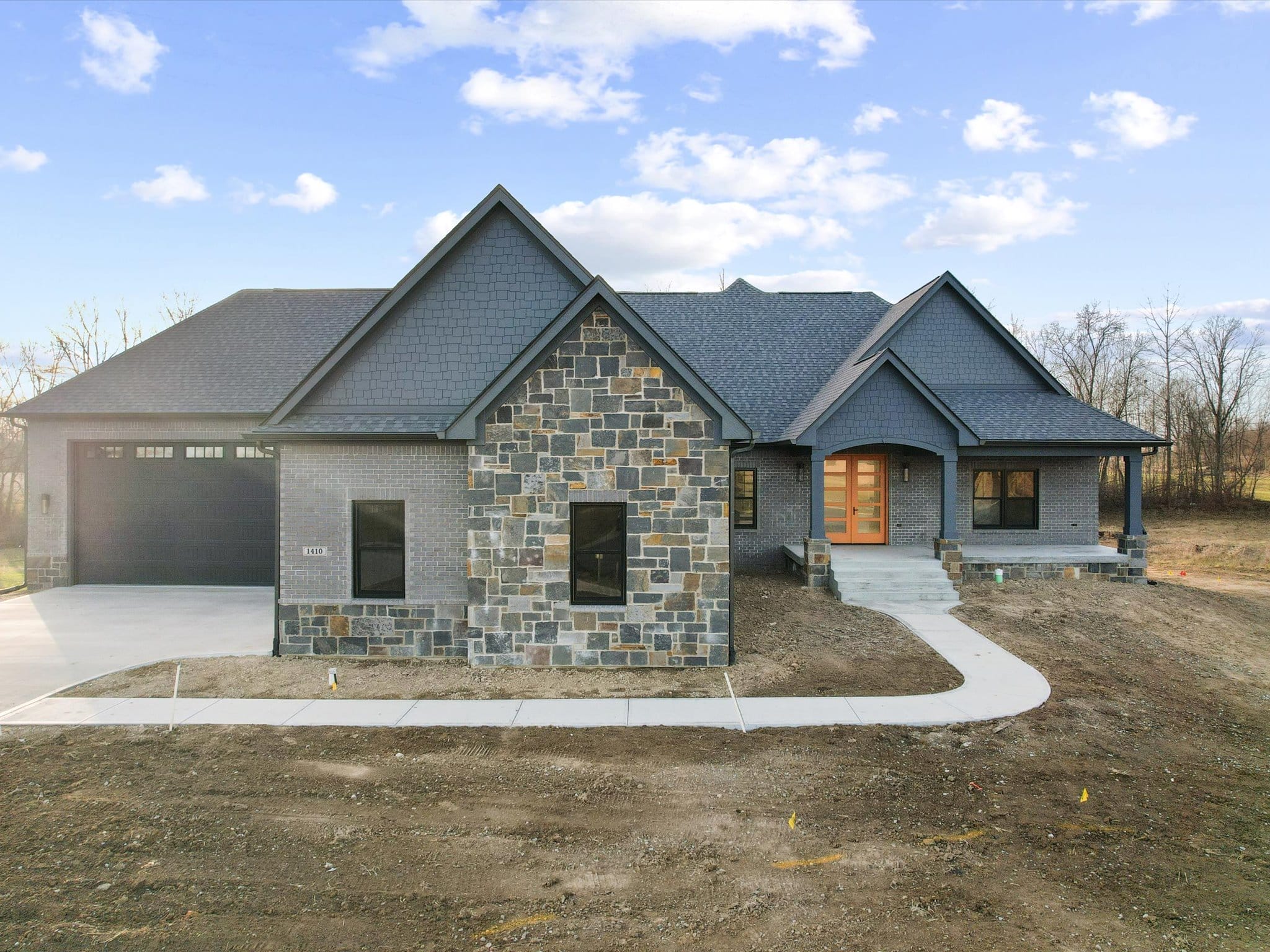 front elevation stone brick shake
