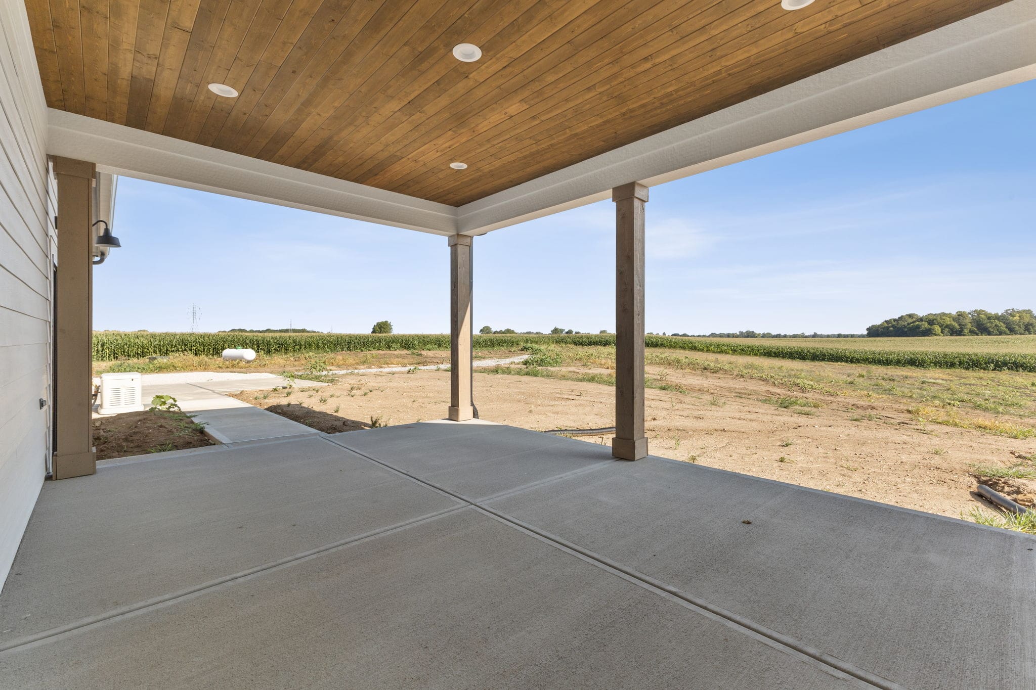 back patio porch stained v groove car siding columns