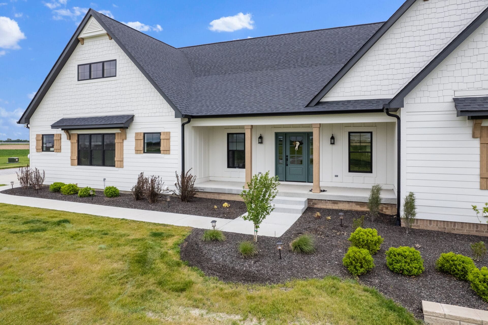 front porch shake columns cedar shutters landscape decorative gable